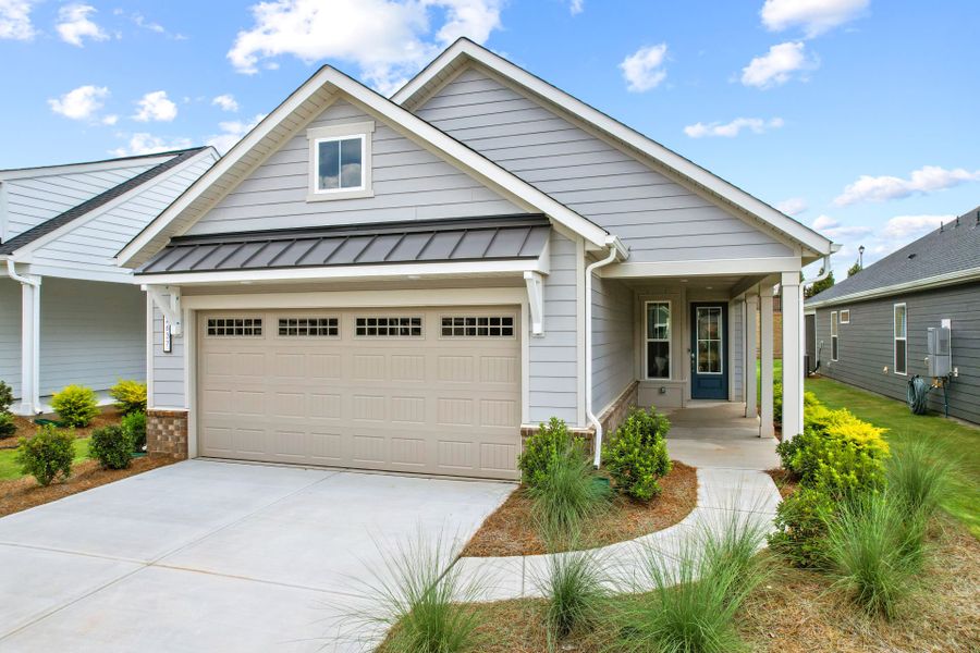 Front exterior of a new home in Carolina Riverside, Belmont, NC, highlighting curb appeal (Image 29). Front exterior of a new home in Carolina Riverside, Belmont, NC, highlighting curb appeal (Image 29).