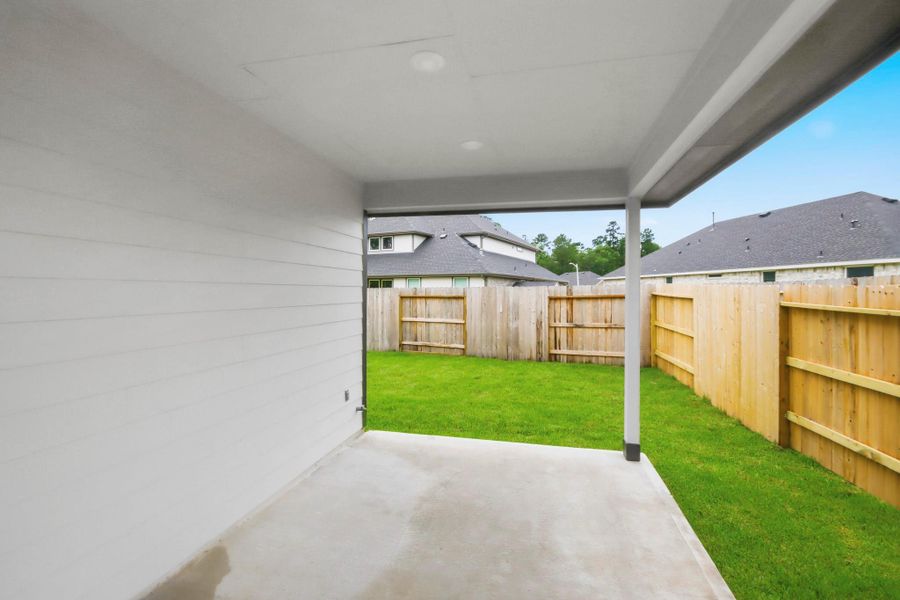 Exterior details and patio area of a home in Hills of Westlake, Conroe (Image 2). Exterior details and patio area of a home in Hills of Westlake, Conroe (Image 2).