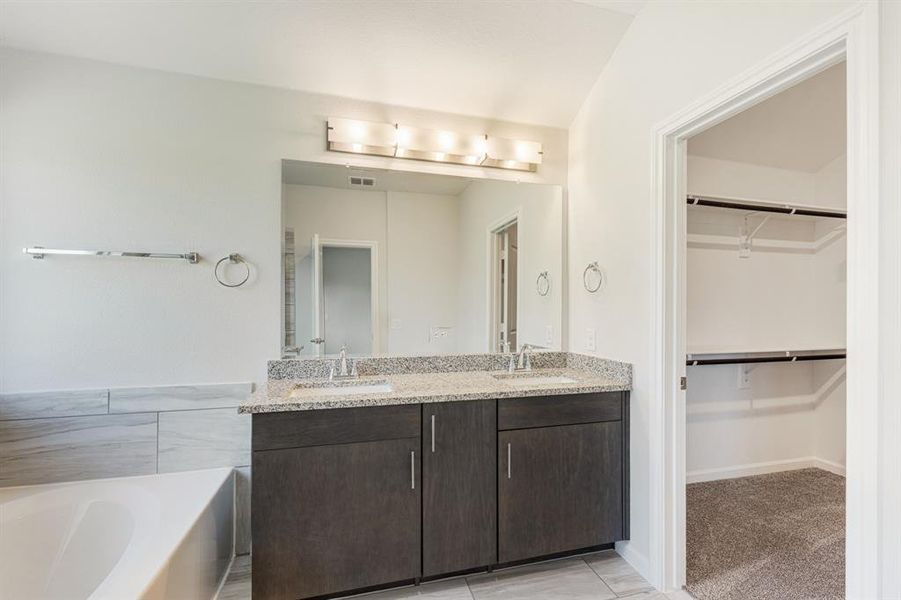Furnished interior view inside a new home in Bear Creek Elements, Lavon (Image 16).