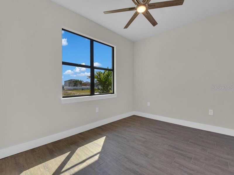 Spacious, unfurnished interior of a new home in , Port Charlotte (Image 30).