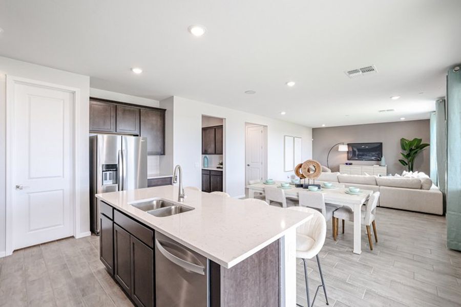A kitchen with white furniture. A kitchen with white furniture.
