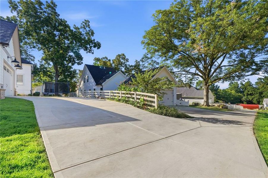 Front exterior of a new home in , Ball Ground, GA, highlighting curb appeal (Image 32).