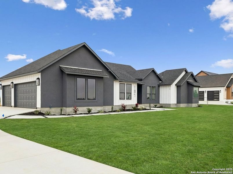 Front exterior of a new home in , Floresville, TX, highlighting curb appeal (Image 23). Front exterior of a new home in , Floresville, TX, highlighting curb appeal (Image 23).