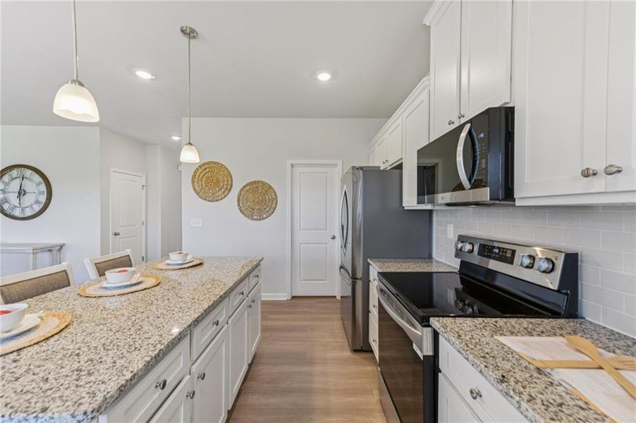 Furnished interior view inside a new home in The Hills at Cedar Creek, Winder (Image 8).