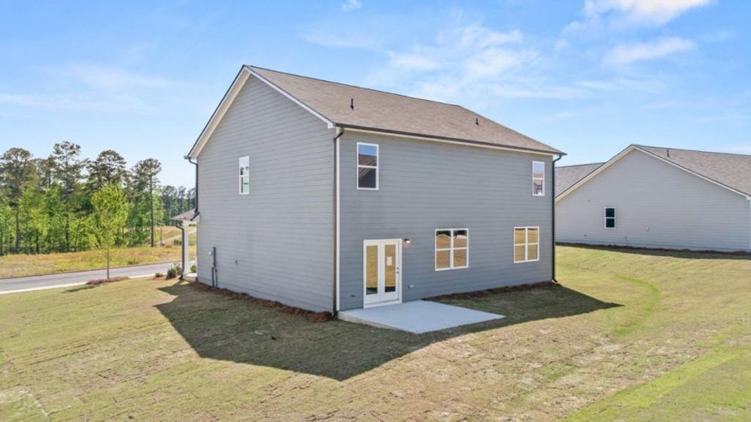 Exterior details and patio area of a home in Fairway 17 at Mirror Lake, Villa Rica (Image 4).