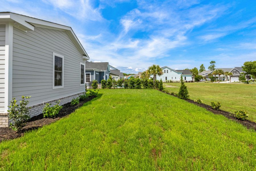 Exterior details and patio area of a home in Creek Pointe, Moncks Corner (Image 28). Exterior details and patio area of a home in Creek Pointe, Moncks Corner (Image 28).