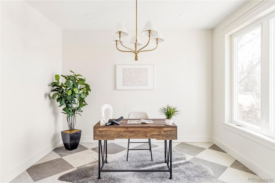 Main-level private office ideal for work-from-home or flex space