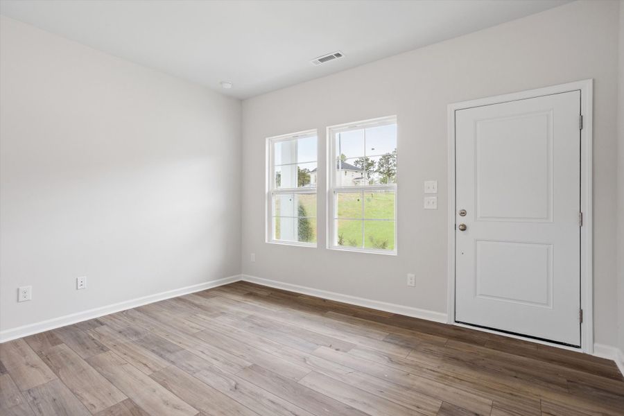 Spacious, unfurnished interior of a new home in Cambridge Reserve, Angier (Image 19).