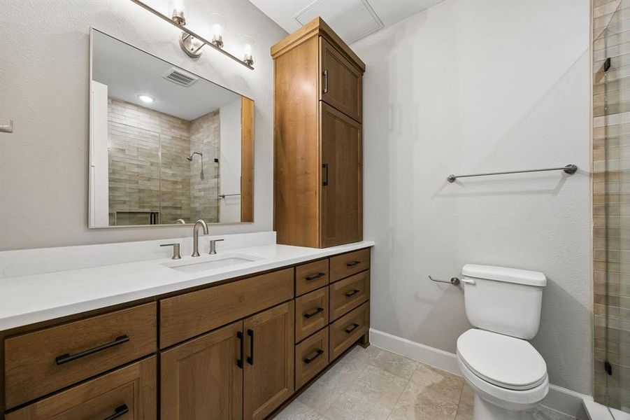Full bathroom with vanity and a shower stall Full bathroom with vanity and a shower stall