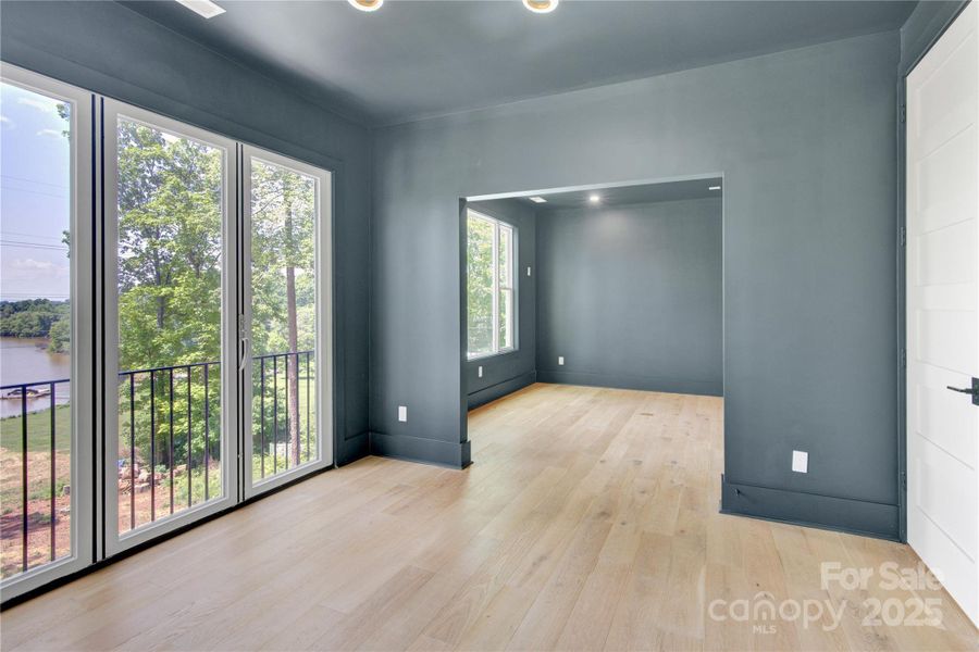 Upper level game room leads to media room Upper level game room leads to media room