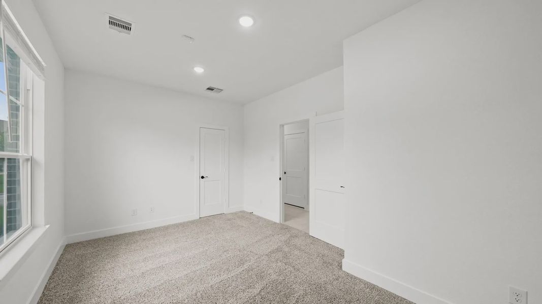 Spacious, unfurnished interior of a new home in Elyson Courtyard Collection, Katy (Image 15).