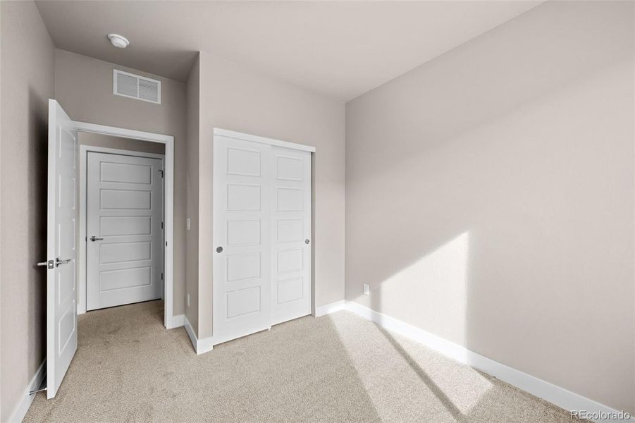 Spacious, unfurnished interior of a new home in Ralston Creek, Arvada (Image 31).
