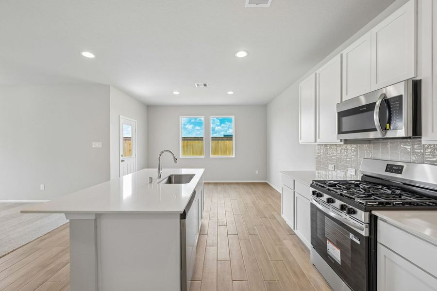 Furnished interior view inside a new home in Azalea, Pattison (Image 11).