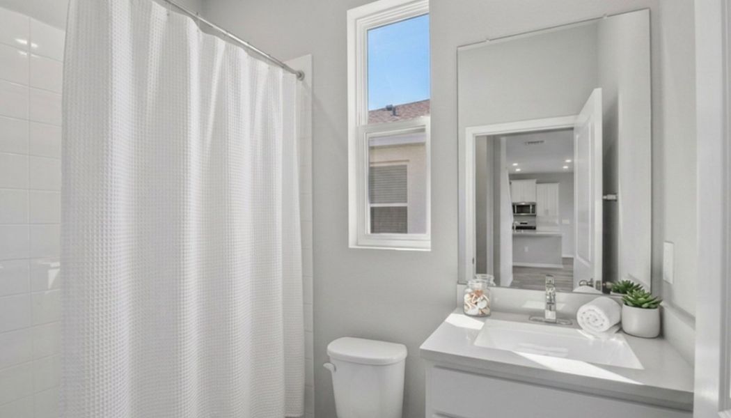 Furnished interior view inside a new home in Deerbrook, Land O' Lakes (Image 8).