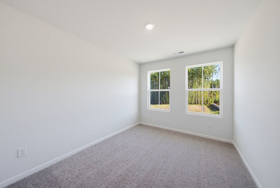 Spacious, unfurnished interior of a new home in Sweetbrier, Durham (Image 24).