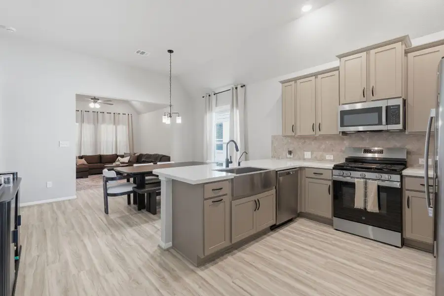 Furnished interior view inside a new home in Lexington Heights, Willis (Image 9).