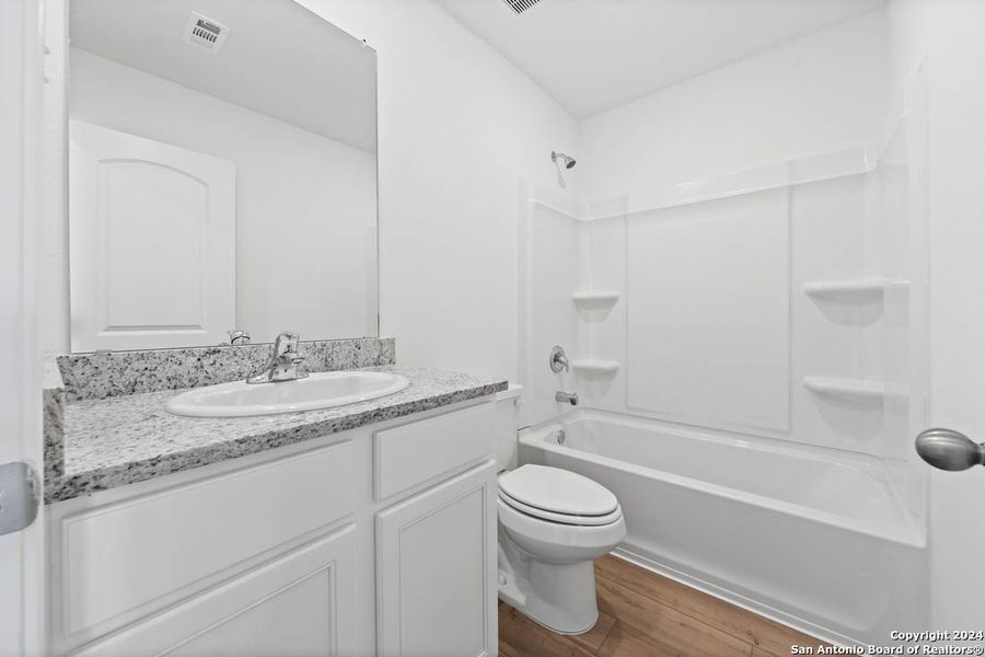 Furnished interior view inside a new home in , San Antonio (Image 8).