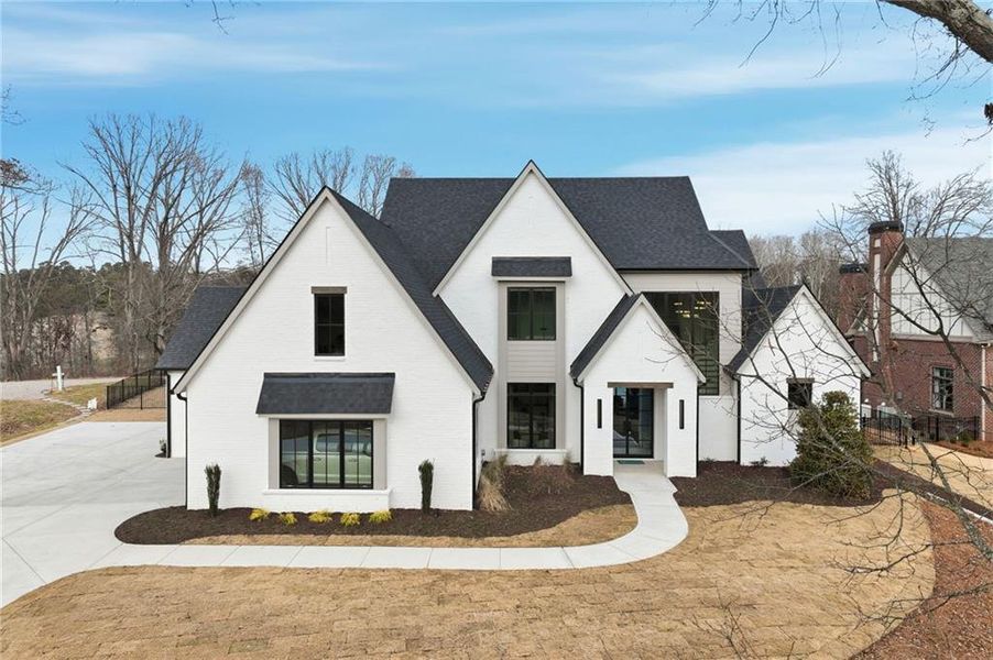 Front exterior of a new home in , Gainesville, GA, highlighting curb appeal (Image 2). Front exterior of a new home in , Gainesville, GA, highlighting curb appeal (Image 2).