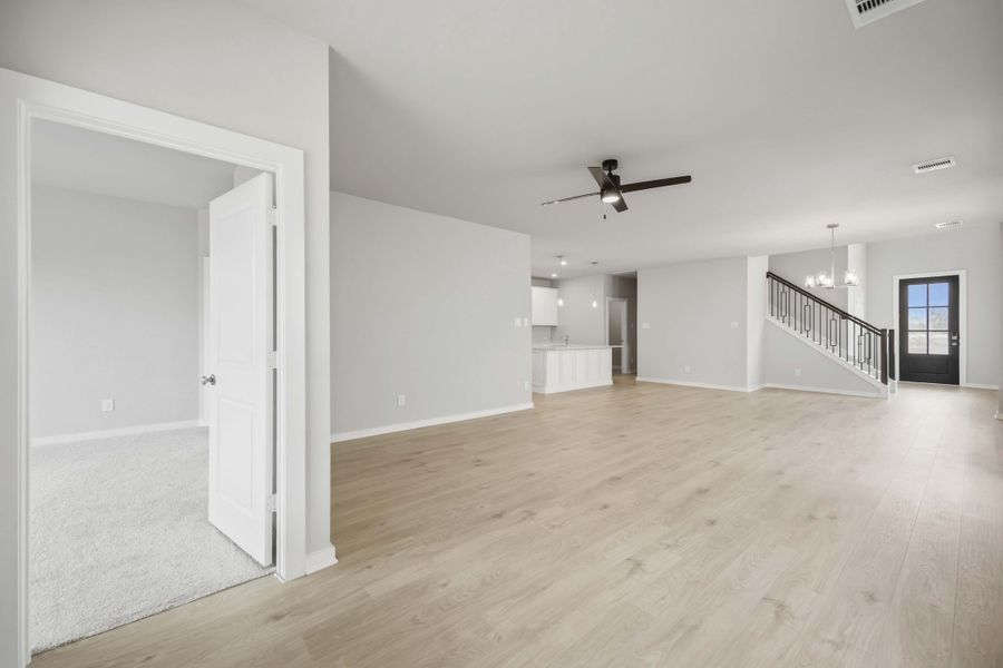 Spacious, unfurnished interior of a new home in Sunterra 40, Katy (Image 17).