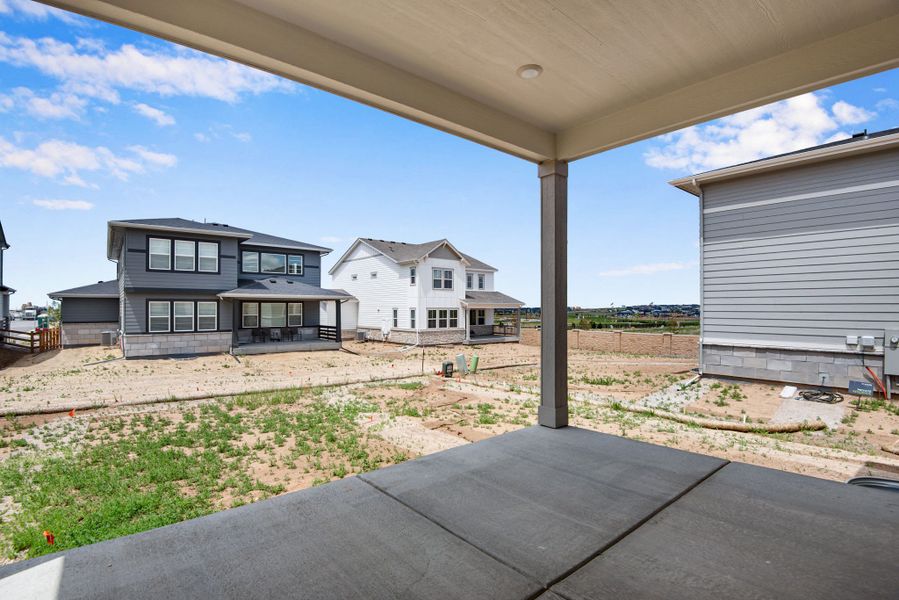 Exterior details and patio area of a home in The Aurora Highlands, Aurora (Image 3).