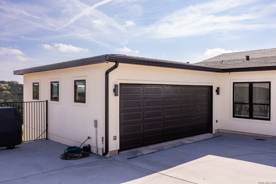 Front exterior of a new home in , Kerrville, TX, highlighting curb appeal (Image 24).