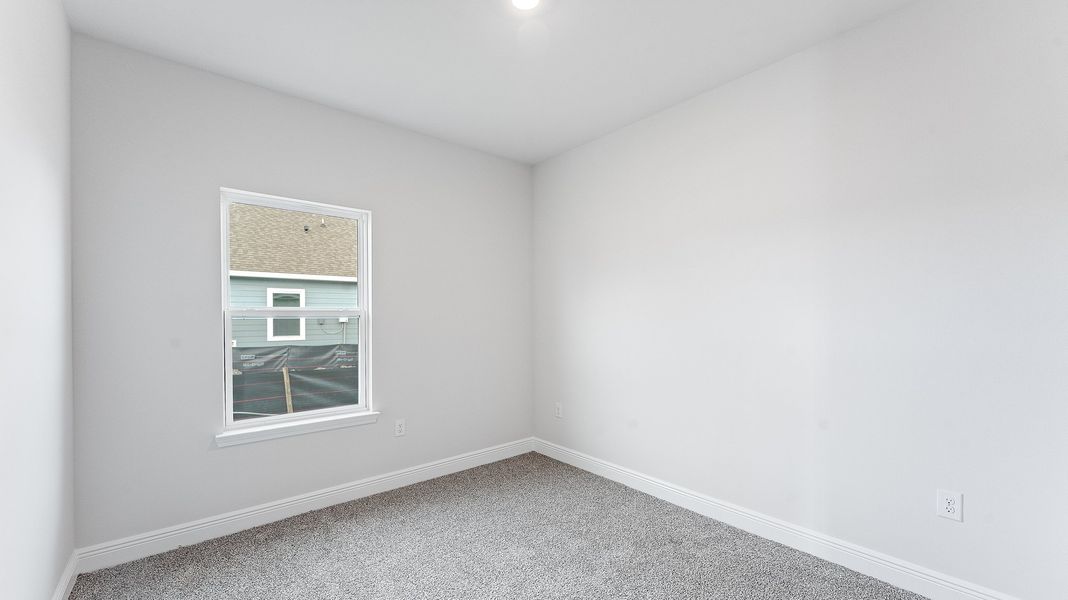 Representative unfurnished interior of a home built from the The Riverside by D.R. Horton in Hodges Bayou Plantation, Panama City (Image 18).