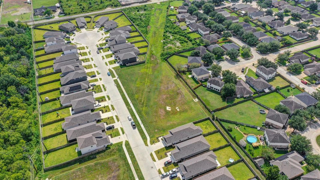 The neighborhood features open green space for extra enjoyment. The neighborhood features open green space for extra enjoyment.