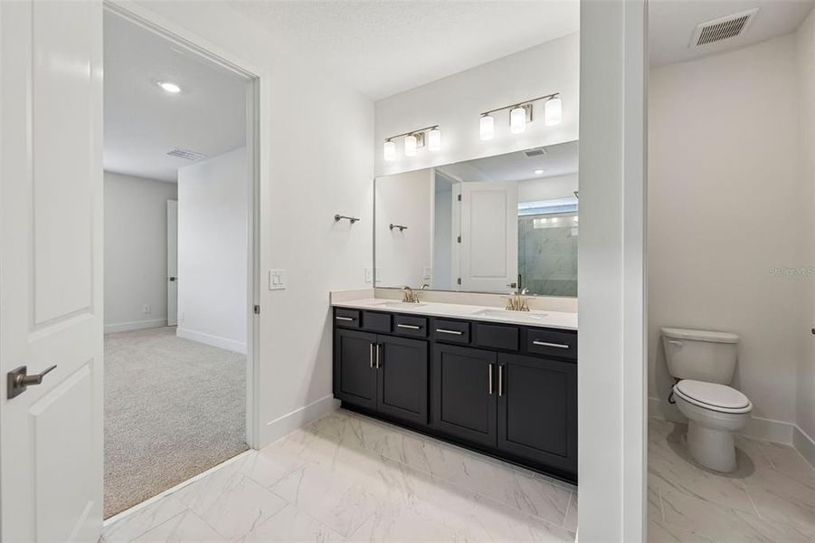 Furnished interior view inside a new home in Ridgehaven - Signature Series, Ormond Beach (Image 4). Furnished interior view inside a new home in Ridgehaven - Signature Series, Ormond Beach (Image 4).
