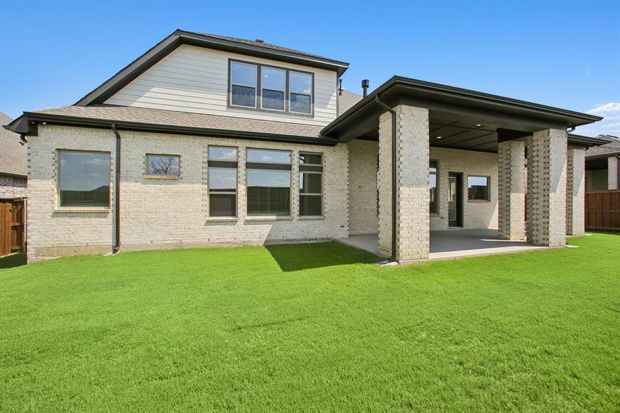 Front exterior of a new home in South Pointe Manor Series, Mansfield, TX, highlighting curb appeal (Image 1).