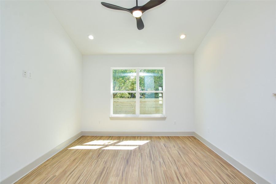 Another view of Great Room area. High ceiling, ceiling fan, recessed can lights.