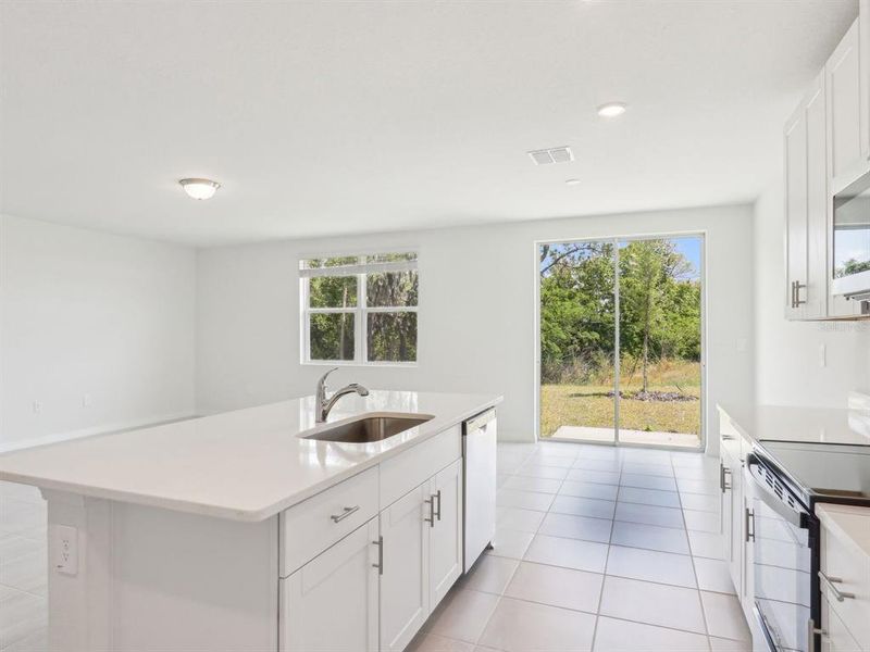 Furnished interior view inside a new home in The Reserve at Van Oaks, Auburndale (Image 7).
