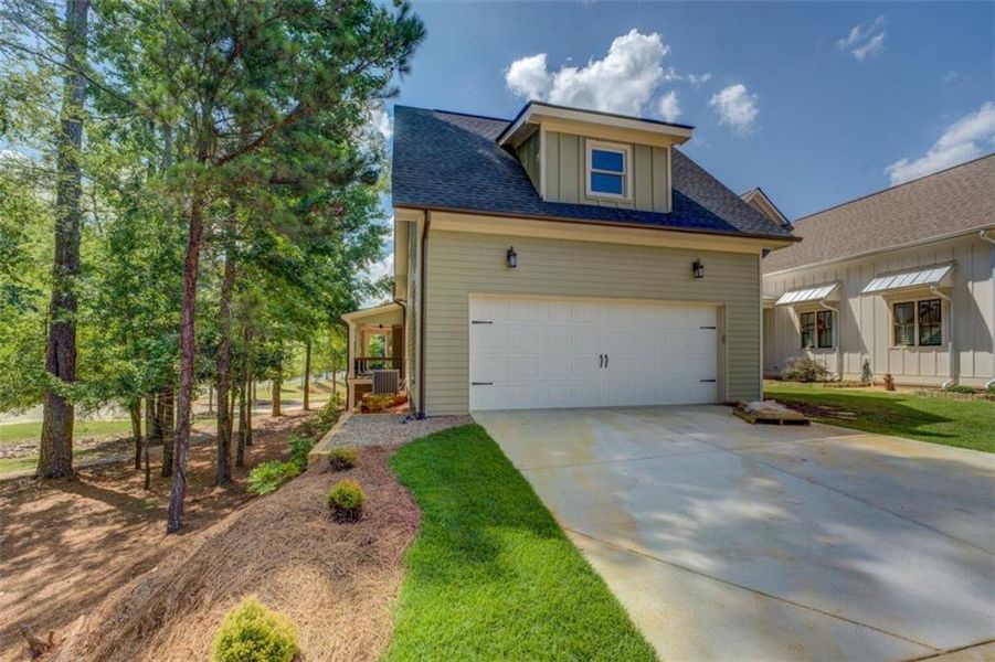 Front exterior of a new home in , Covington, GA, highlighting curb appeal (Image 27). Front exterior of a new home in , Covington, GA, highlighting curb appeal (Image 27).