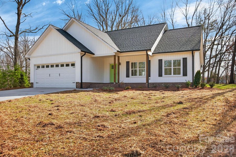 Front exterior of a new home in , Rockwell, NC, highlighting curb appeal (Image 23).