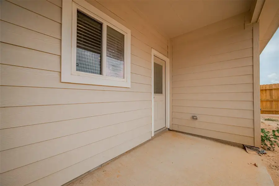 Exterior details and patio area of a home in La Segarra, Brookshire (Image 4). Exterior details and patio area of a home in La Segarra, Brookshire (Image 4).