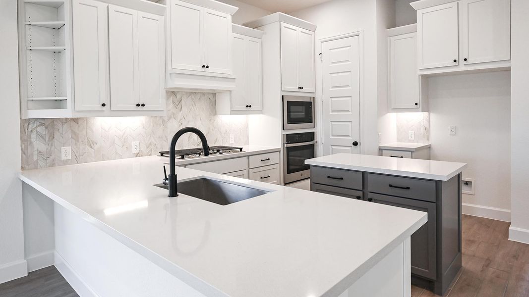 Furnished interior view inside a new home in 6 Creeks, Kyle (Image 10).