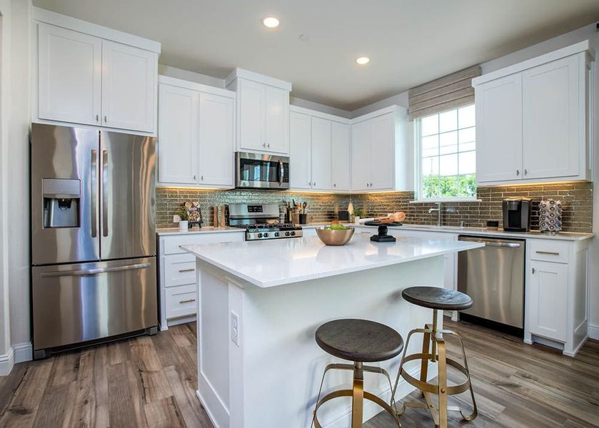 Image 9 representing the Dogwood by CB JENI Homes in The Grove, Frisco, TX.