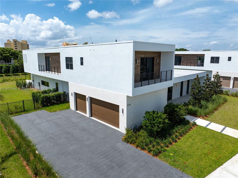 Front exterior of a new home in , Weston, FL, highlighting curb appeal (Image 2).