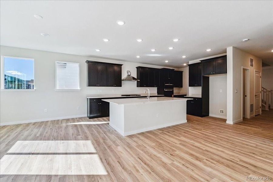 Furnished interior view inside a new home in Floret Collection at Alder Creek, Parker (Image 11).