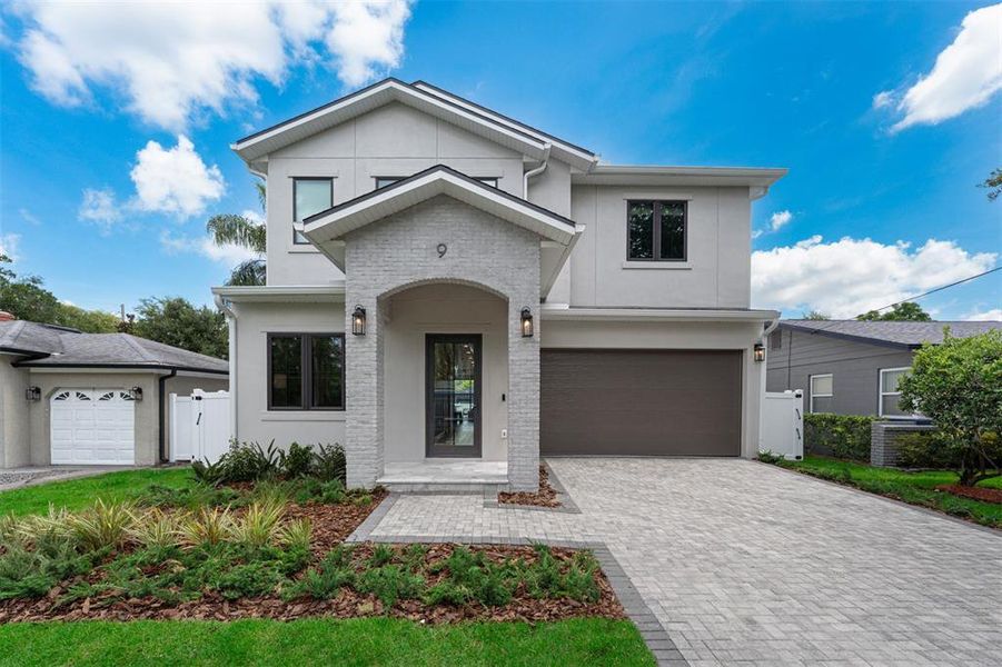 Front exterior of a new home in , Orlando, FL, highlighting curb appeal (Image 24).