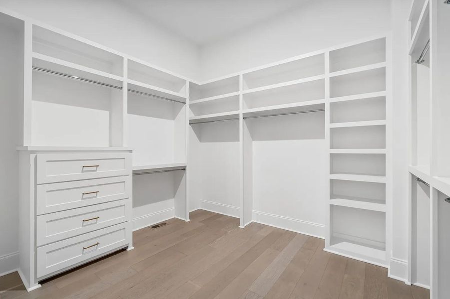 The Wilshire E Primary Suite Bedroom Closet