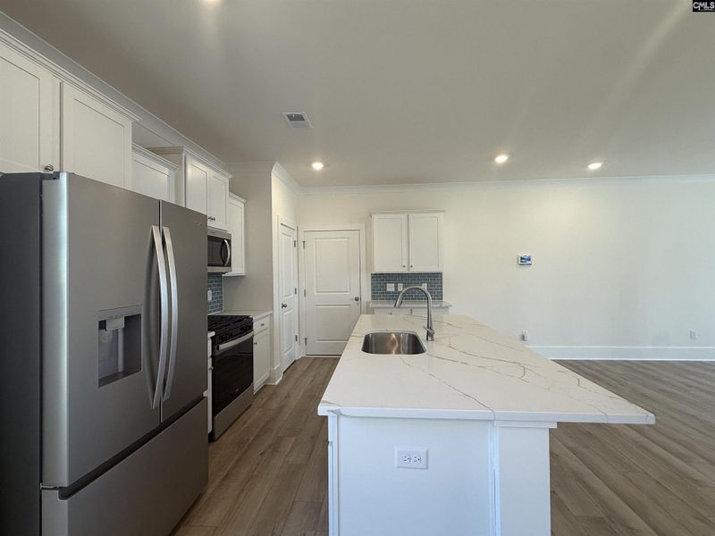 Furnished interior view inside a new home in Cottages at Roofs Pond, West Columbia (Image 3).