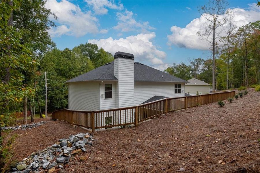 Exterior details and patio area of a home in Holiday Pines, Buford (Image 20).