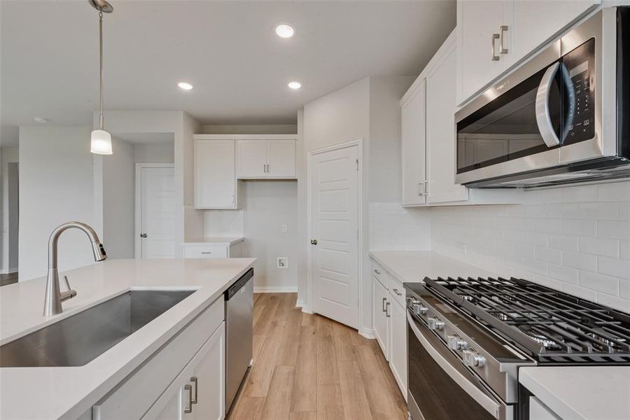 Furnished interior view inside a new home in Spiritas Ranch, Little Elm (Image 8). Furnished interior view inside a new home in Spiritas Ranch, Little Elm (Image 8).