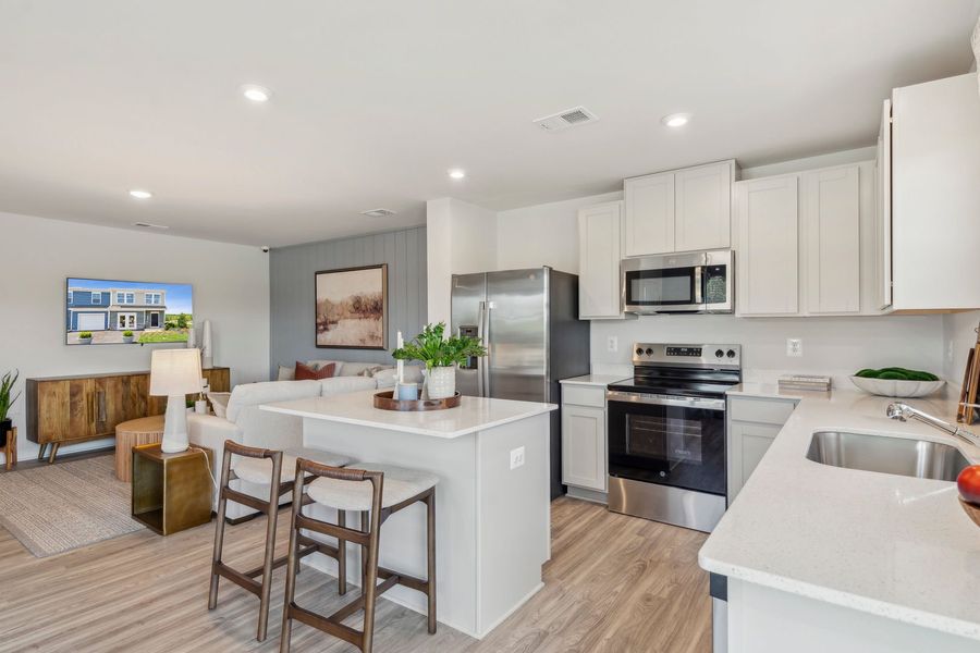 Representative furnished interior of a home built from the The Rutledge by Stanley Martin Homes in Essence at Trinity Townhomes, Columbia (Image 24).