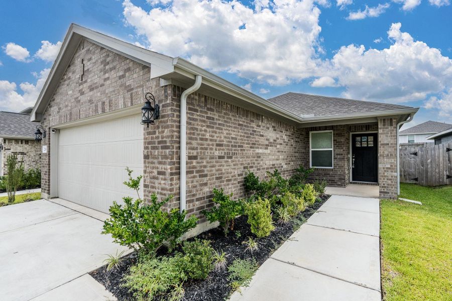 Exterior details and patio area of a home in Pine Lake Cove - Traditional Series, Montgomery (Image 3).