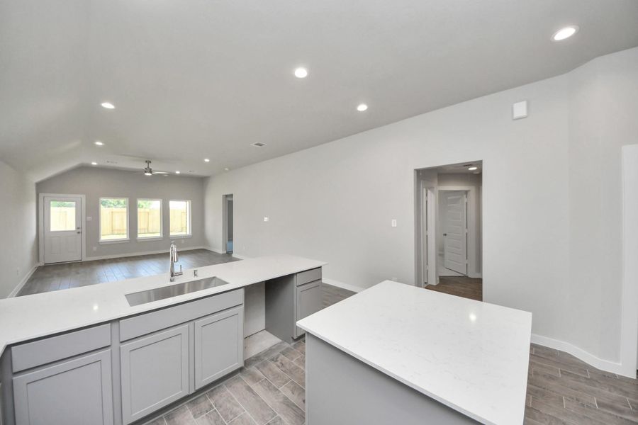 This kitchen is truly a chef's dream! Sample photo of completed home with similar floor plan. Actual colors and selections may vary. This kitchen is truly a chef's dream! Sample photo of completed home with similar floor plan. Actual colors and selections may vary.