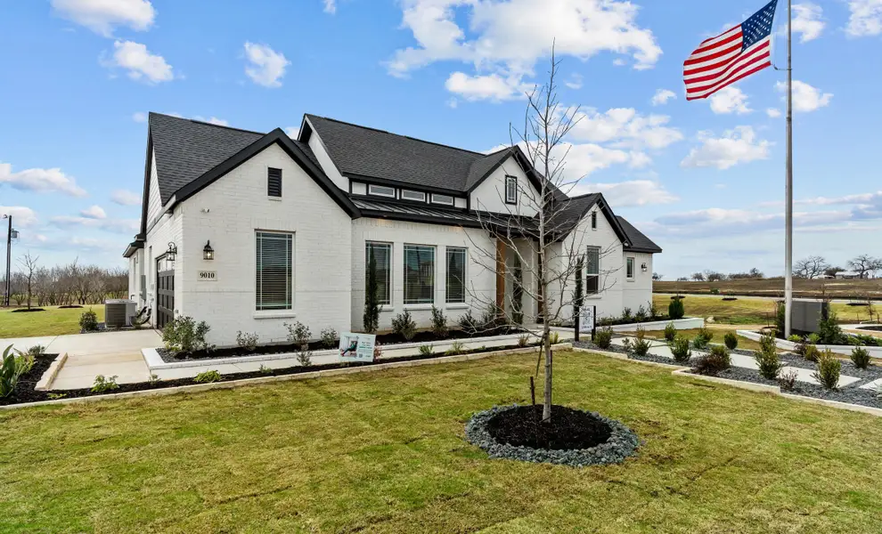 Front exterior of a home in the Sienna Lakes community, located in San Antonio, TX (Image 11).