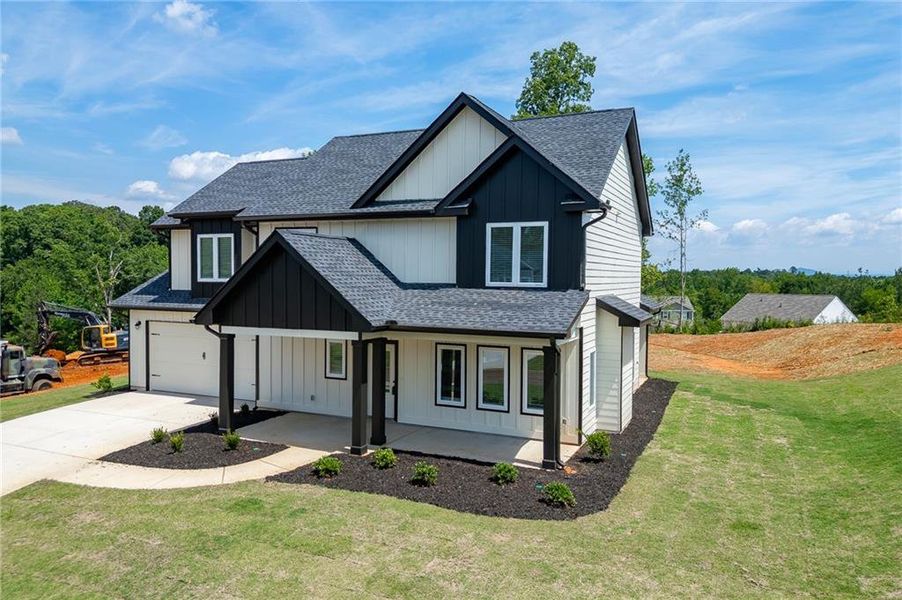 Front exterior of a new home in , Toccoa, GA, highlighting curb appeal (Image 28). Front exterior of a new home in , Toccoa, GA, highlighting curb appeal (Image 28).