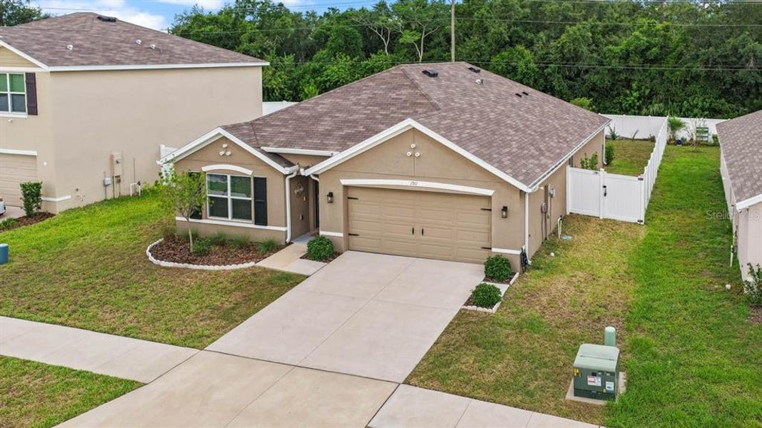 Front exterior of a new home in Brookside, Ruskin, FL, highlighting curb appeal (Image 27).