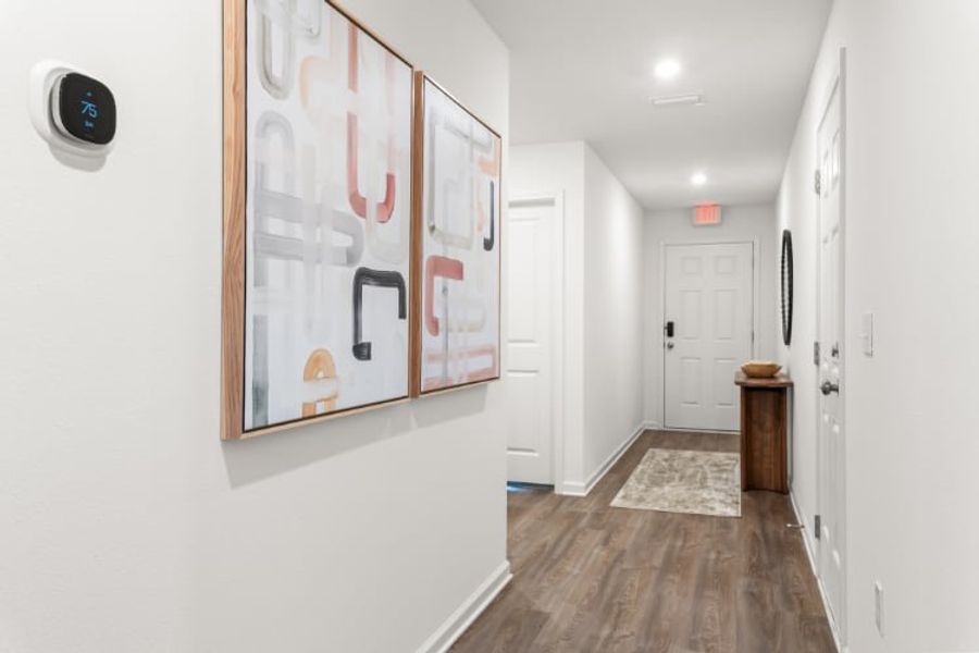 A hallway with white walls. A hallway with white walls.